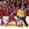 TORONTO, CANADA - JANUARY 4:  Swedenâ€™s Lucas Wallmark #23 skates by as Team Russia celebrates after scoring their second goal of the game during semifinal round action at the 2015 IIHF World Junior Championship. (Photo by Richard Wolowicz/HHOF-IIHF Images)